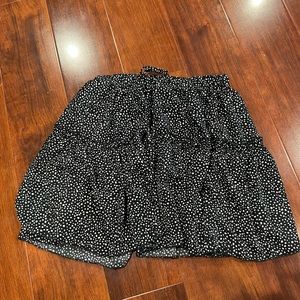 black skirt with white polka dots